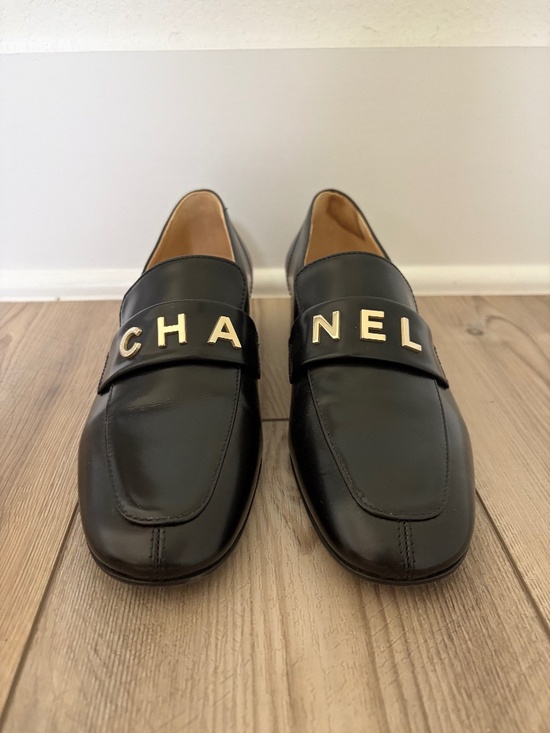 CHANEL Shoes - CHANEL Shiny Calfskin Logo Loafers